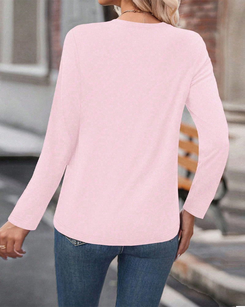 Maglia a maniche lunghe con cuore e scollo rotondo
