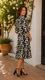 Abito elegante stampato con scollo a V