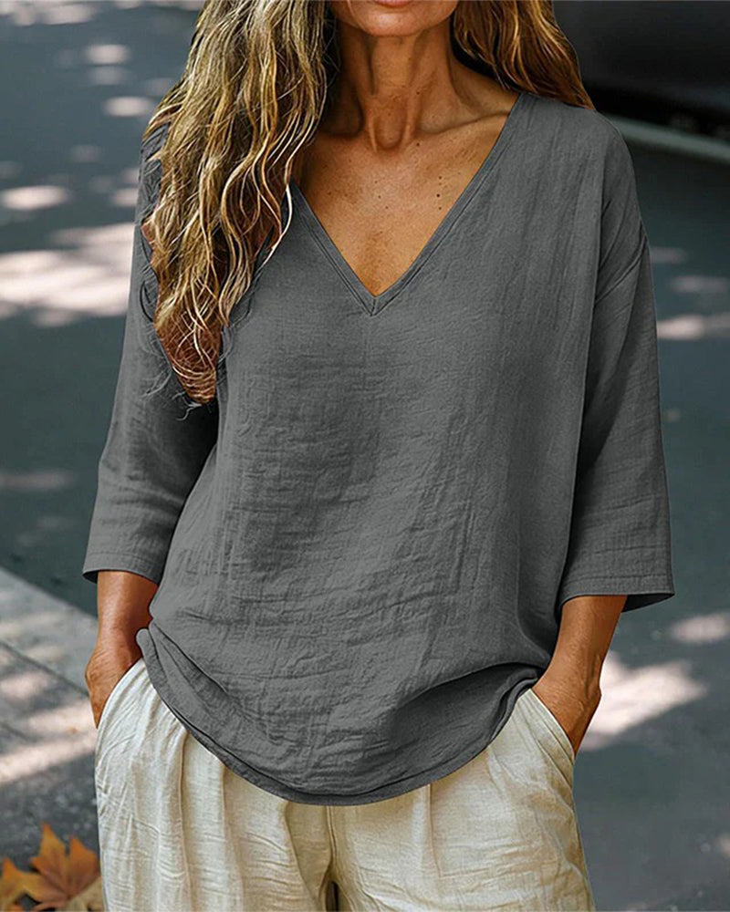 Blusa con spalle scese, scollo a V e maniche a 3/4
