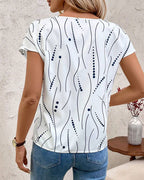T-shirt scollo a V a maniche corte stampato