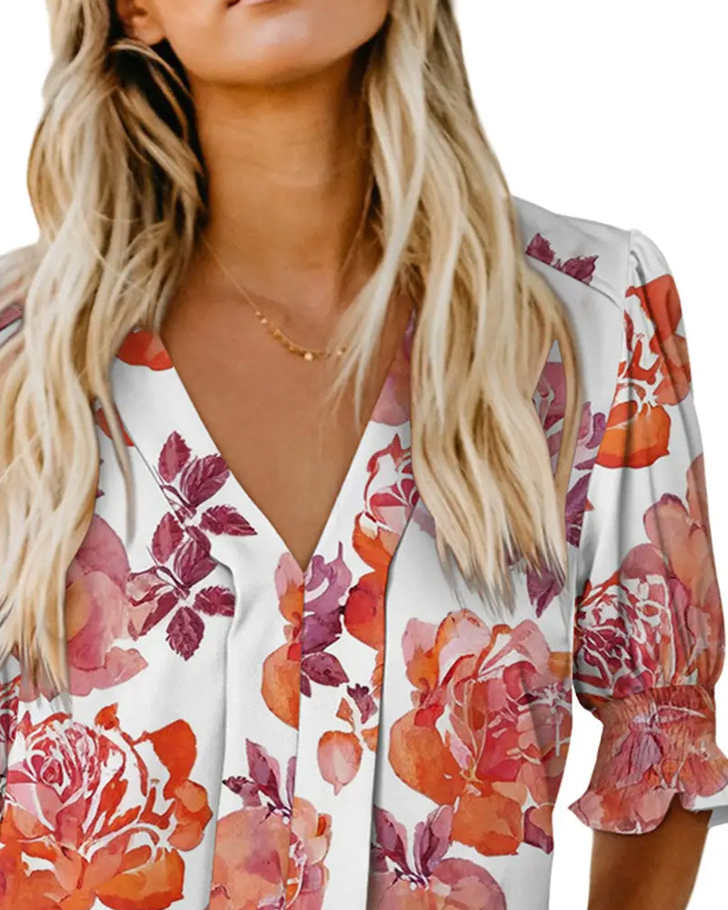 Camicetta elegante con piccola stampa floreale