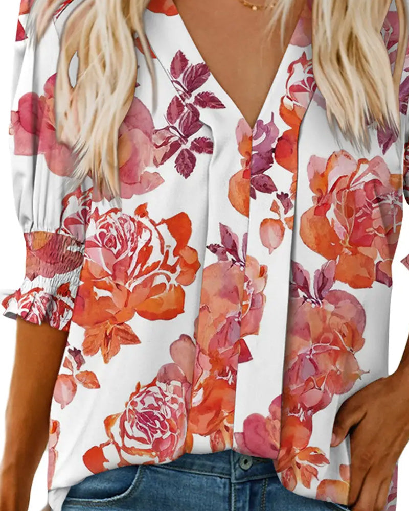 Camicetta elegante con piccola stampa floreale