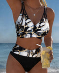 Bikini con bretelle e intagli design