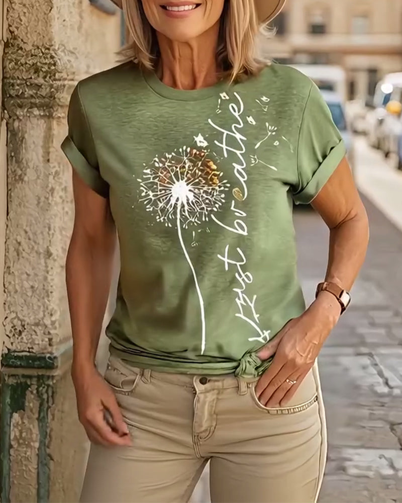 T-shirt a maniche corte stampato con dente di leone
