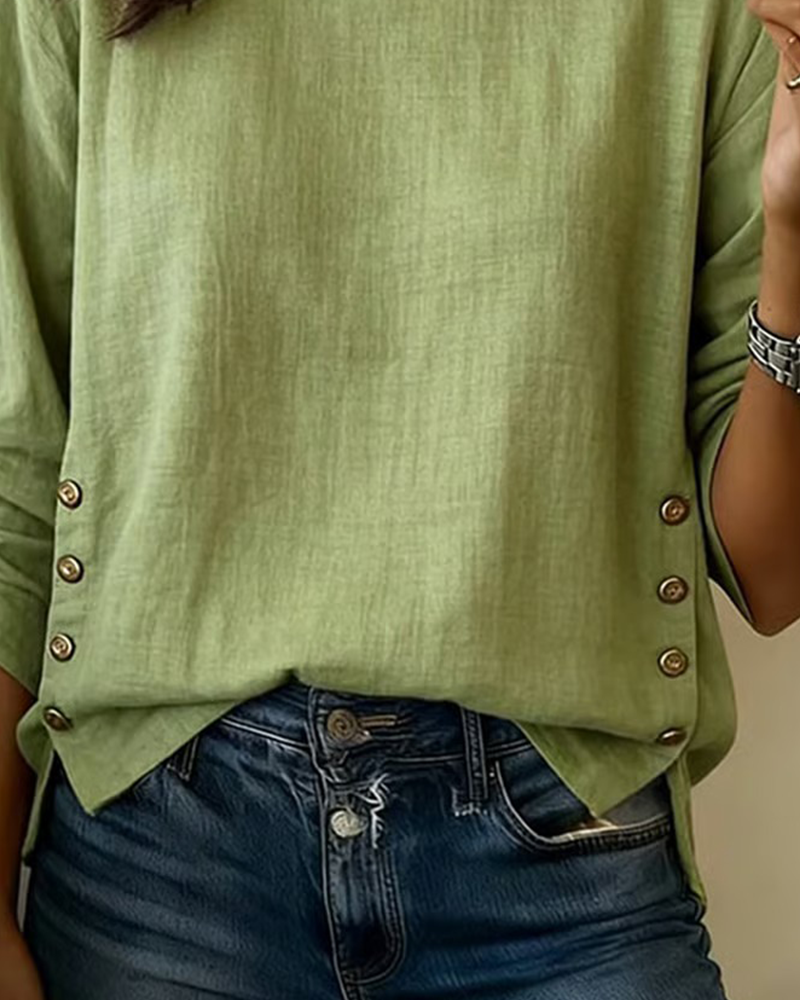 Top casual con scollo rotondo e bottone decorativo