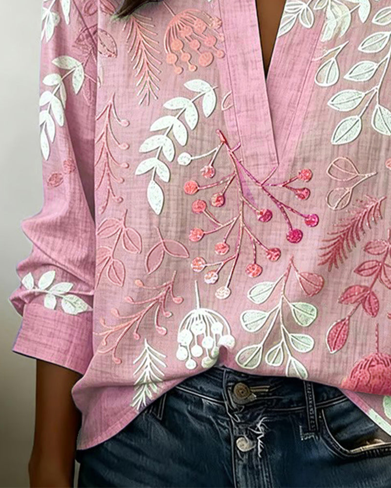 Camicetta con stampa floreale e collo alto