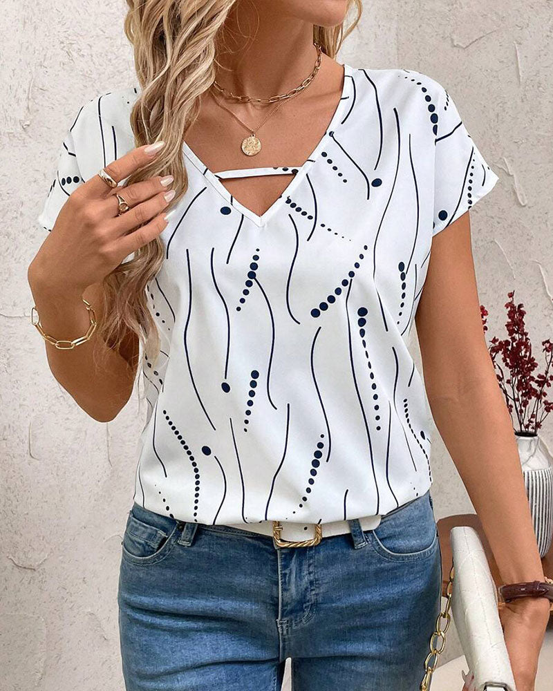 T-shirt scollo a V a maniche corte stampato