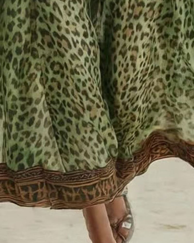 Abito lungo senza maniche con stampa leopardata e mezza cerniera