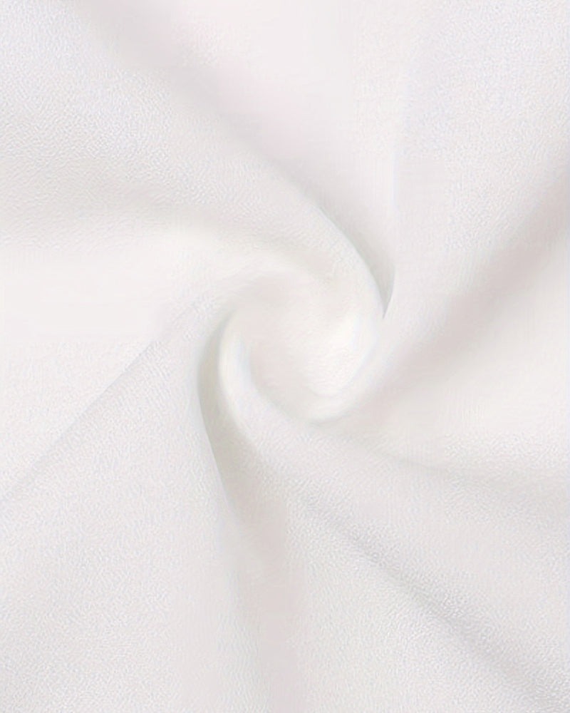 Blusa con spalle scoperte e trafori tinta unita