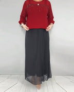 Blusa in maglia a trama larga e vestibilità ampia
