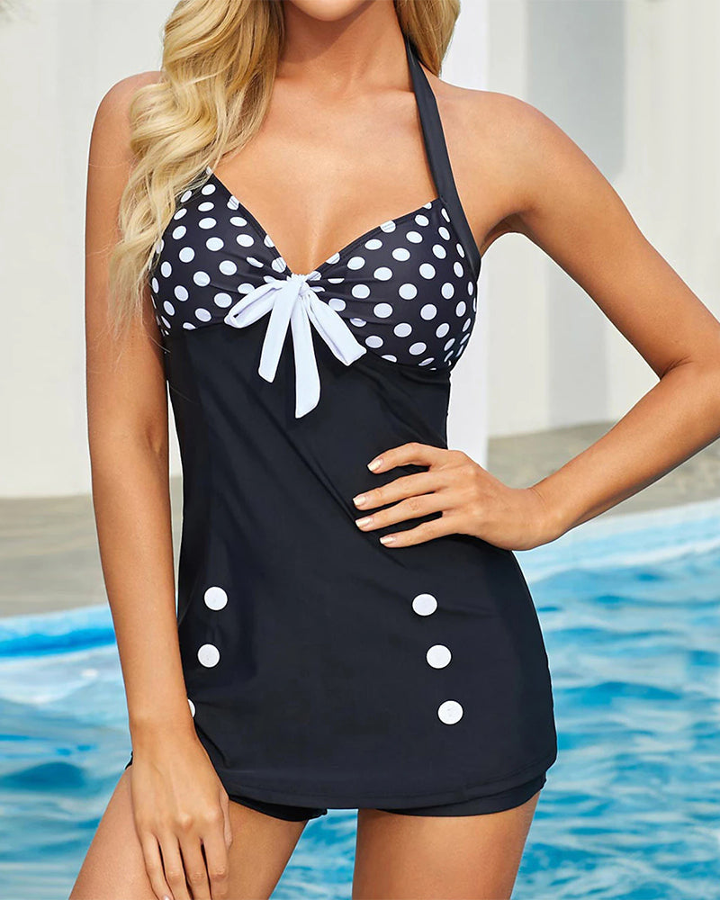 Costume da bagno dimagrante a pois con scollo all'americana