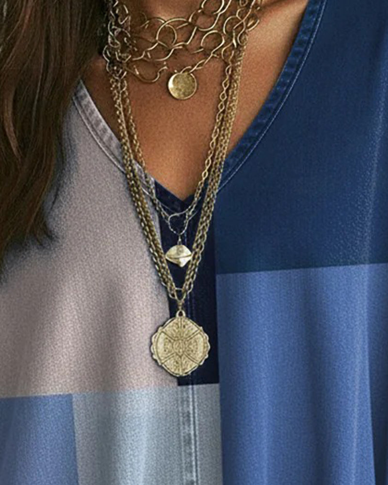 Maglia ampia con scollo a V a blocchi di colore