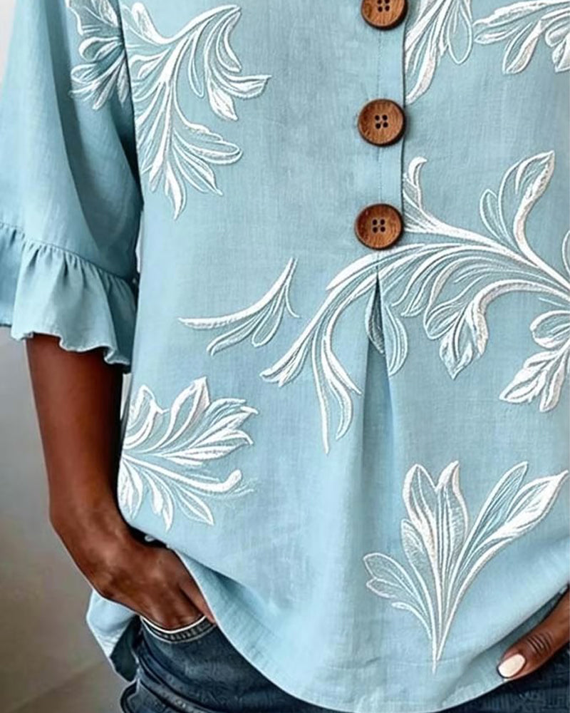 Camicia con ruches sulle maniche e tre bottoni