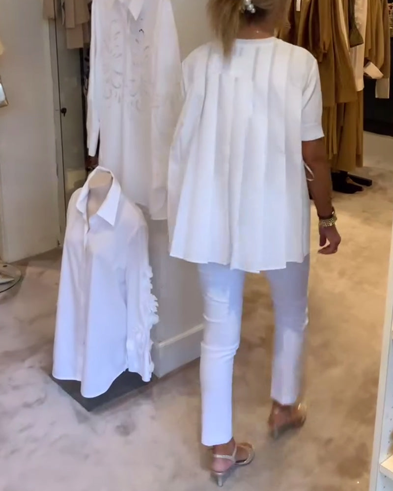 Camicia plissettata a tinta unita ampia