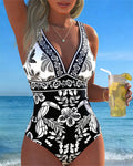 Costume intero con fiori e uccelli tropicali