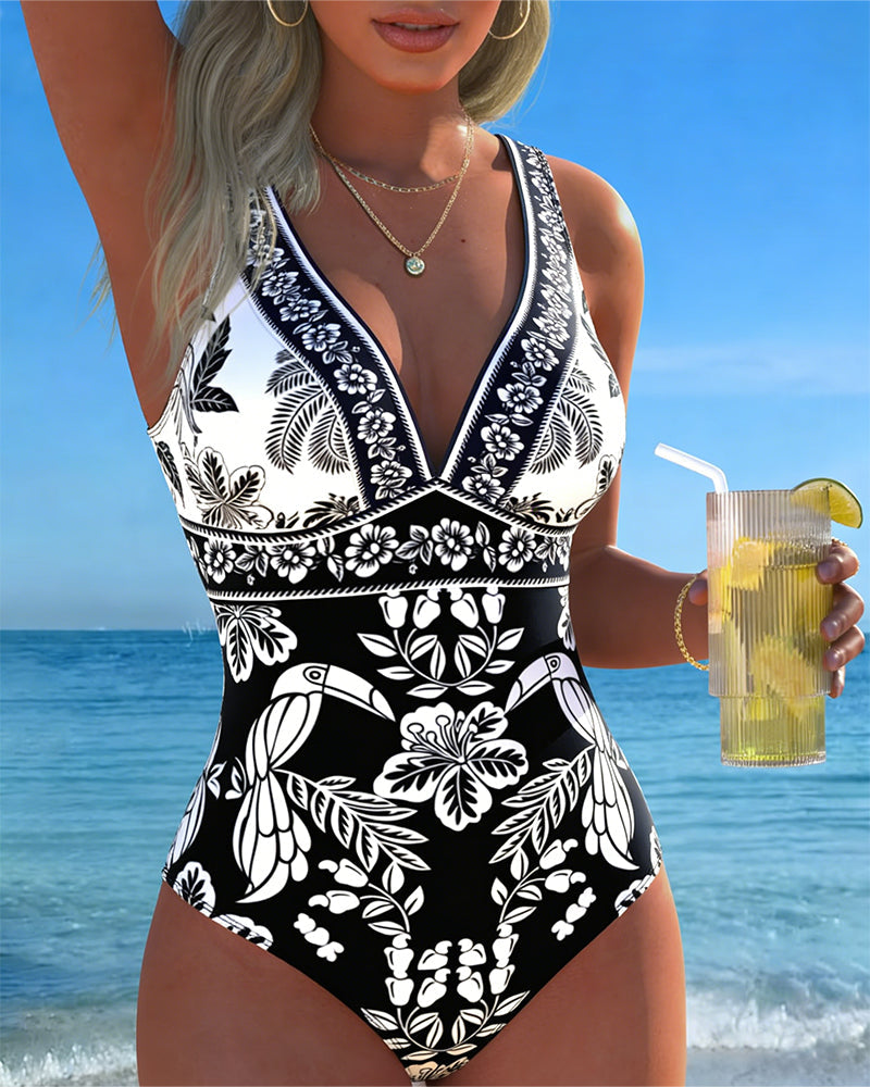 Costume intero con fiori e uccelli tropicali