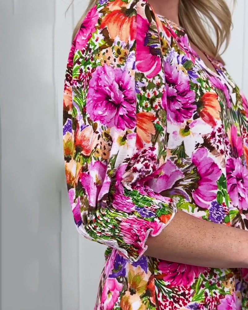Blusa a maniche corte di tendenza floreale