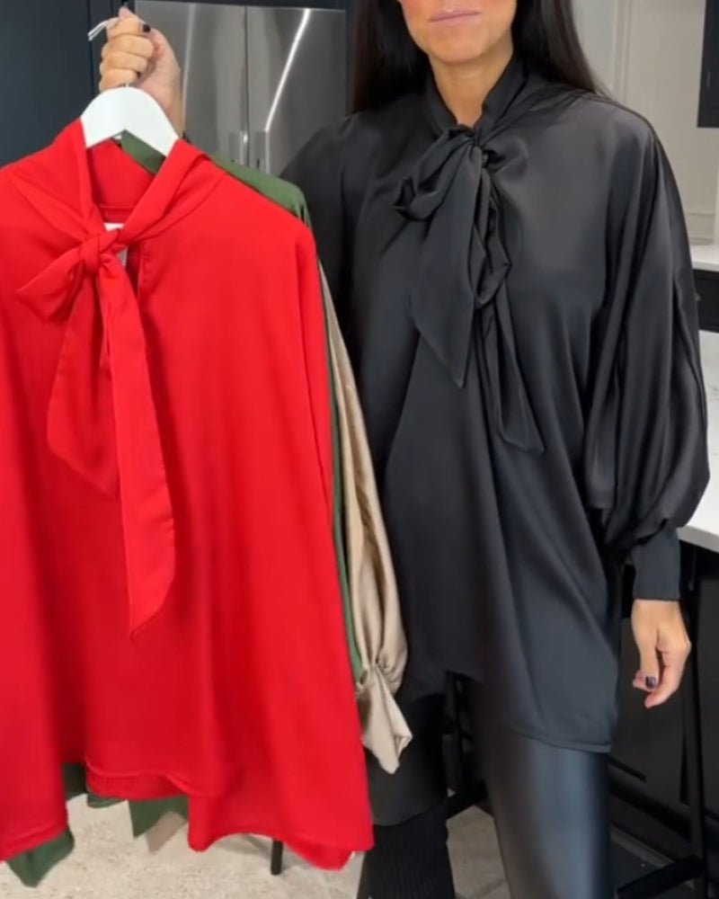 Con nastro monocolore e camicetta elegante