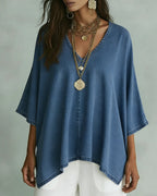 Camicetta in denim ampia con scollo a V irregolare