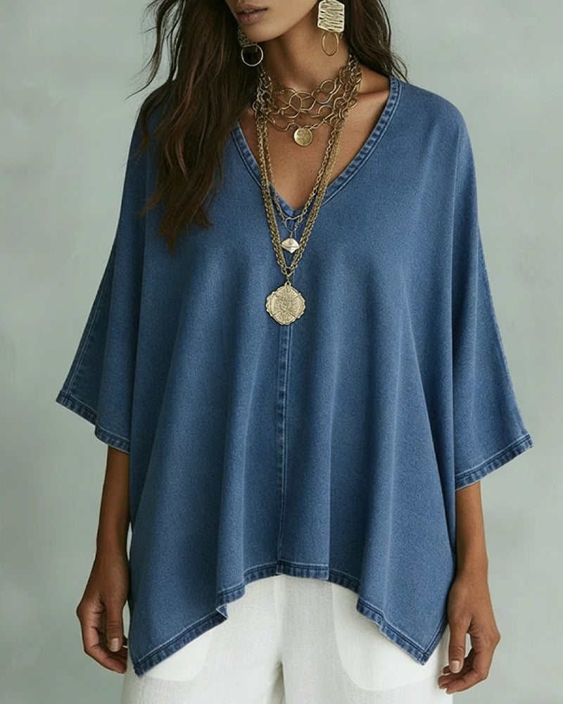 Camicetta in denim ampia con scollo a V irregolare