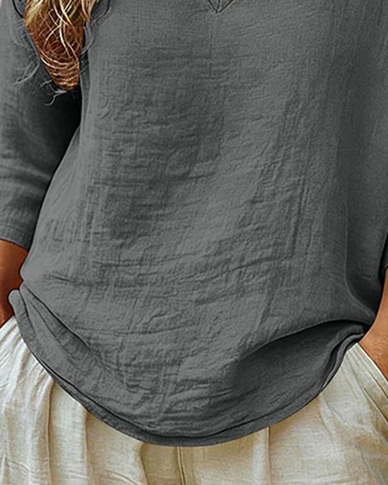 Blusa con spalle scese, scollo a V e maniche a 3/4