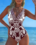 Costume intero con fiori e uccelli tropicali