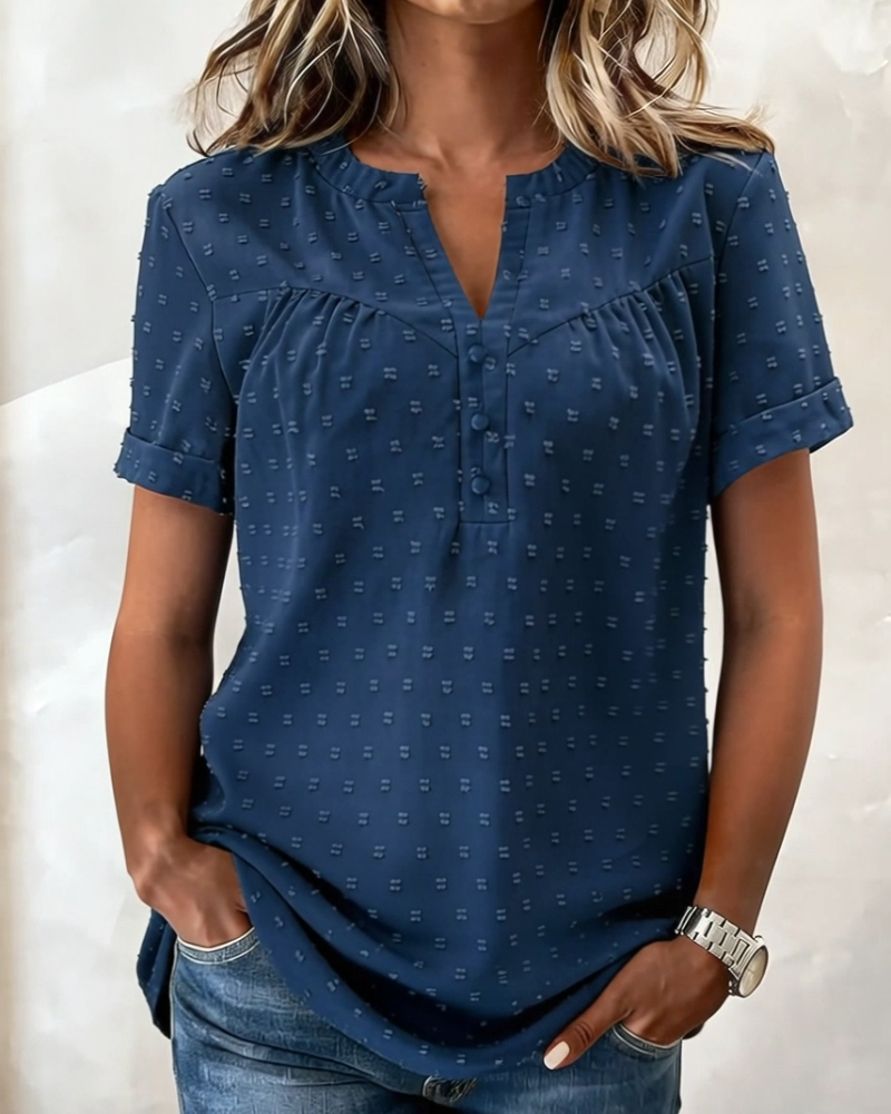 Camicetta jacquard con scollo a V, mezza abbottonatura e maniche corte