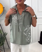 Blusa casual con cappuccio e maniche corte con stampa floreale