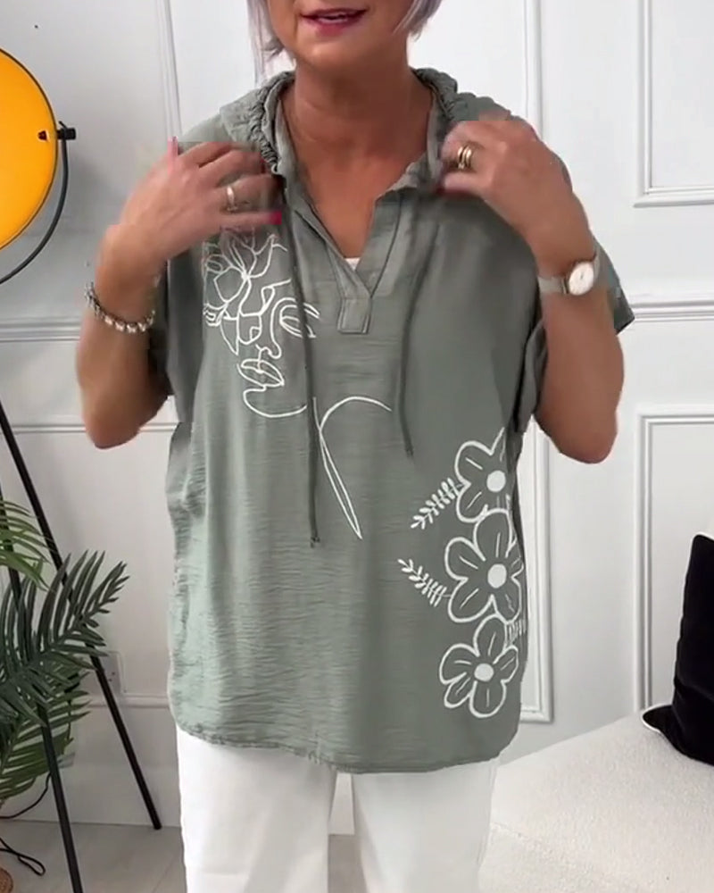 Blusa casual con cappuccio e maniche corte con stampa floreale