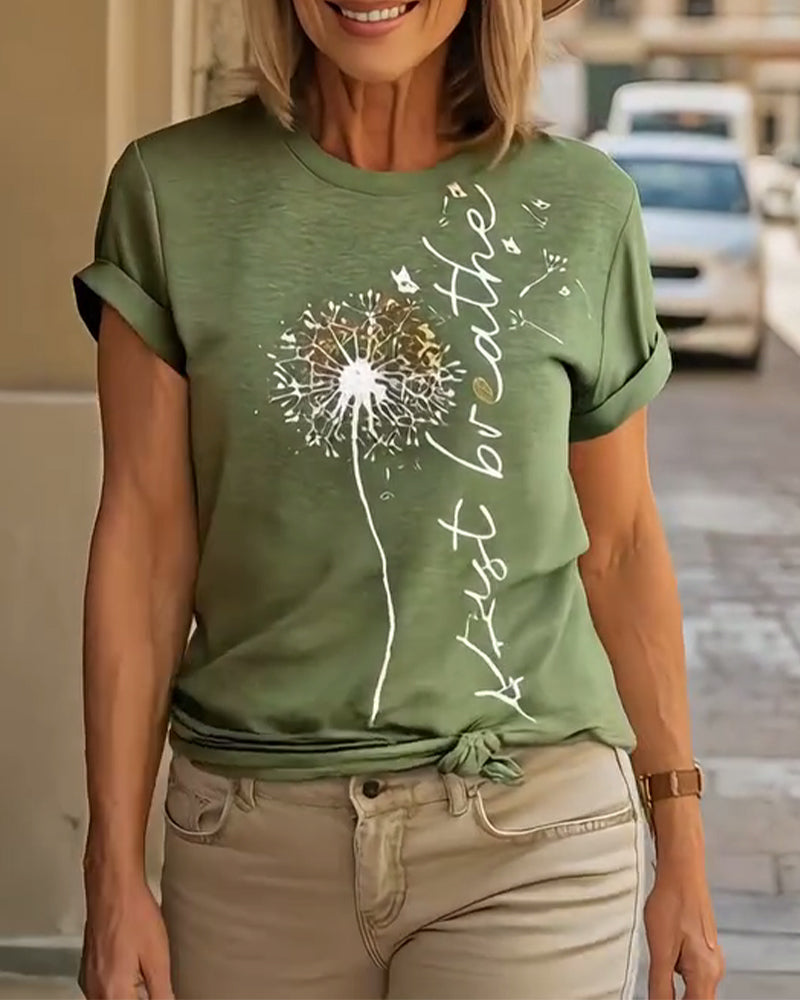 T-shirt a maniche corte stampato con dente di leone