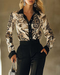 Camicia stampata leopardata con colletto a revers alla moda