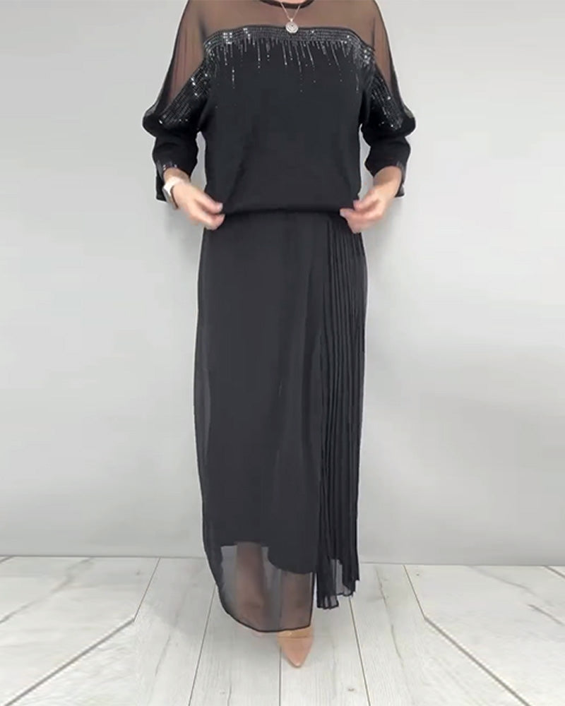 Blusa in maglia a trama larga e vestibilità ampia