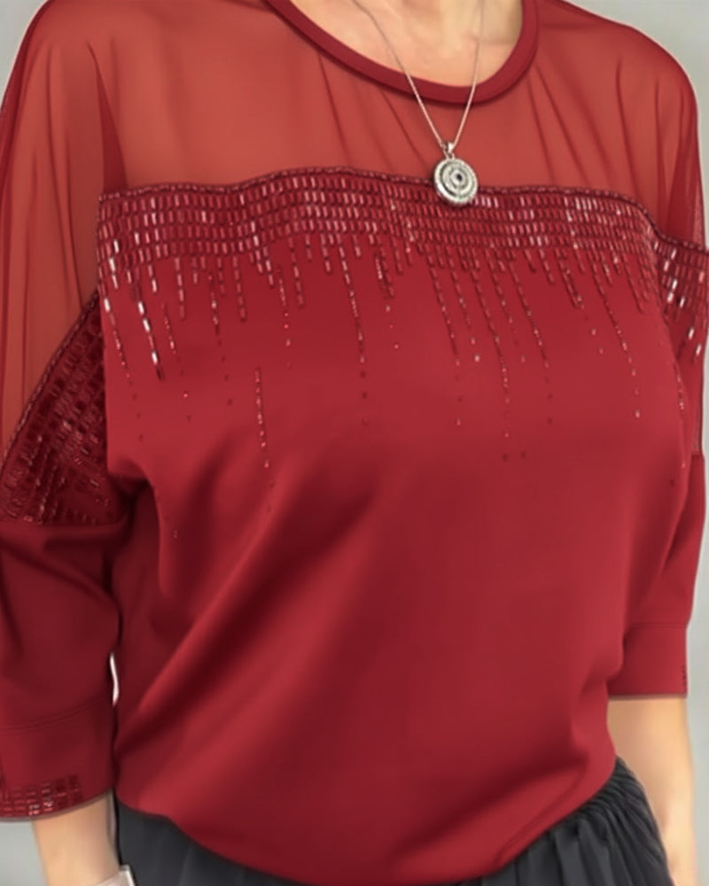 Blusa in maglia a trama larga e vestibilità ampia