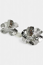 Orecchini a perno con strass a forma di fiore