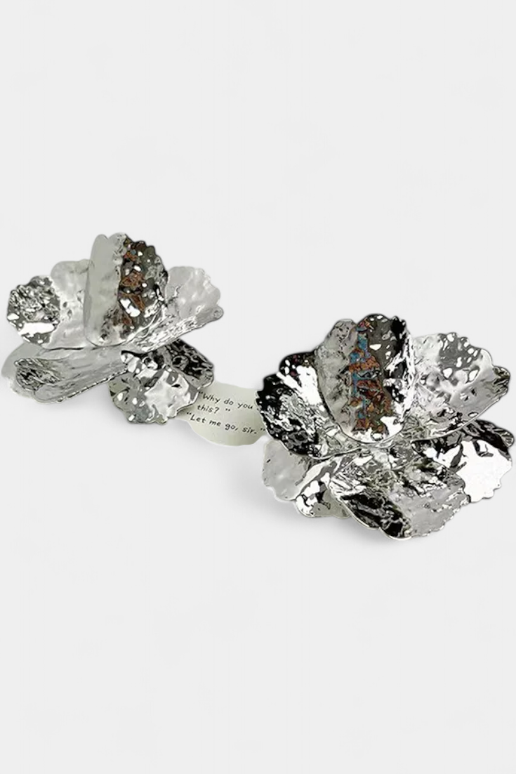 Orecchini a perno con strass a forma di fiore